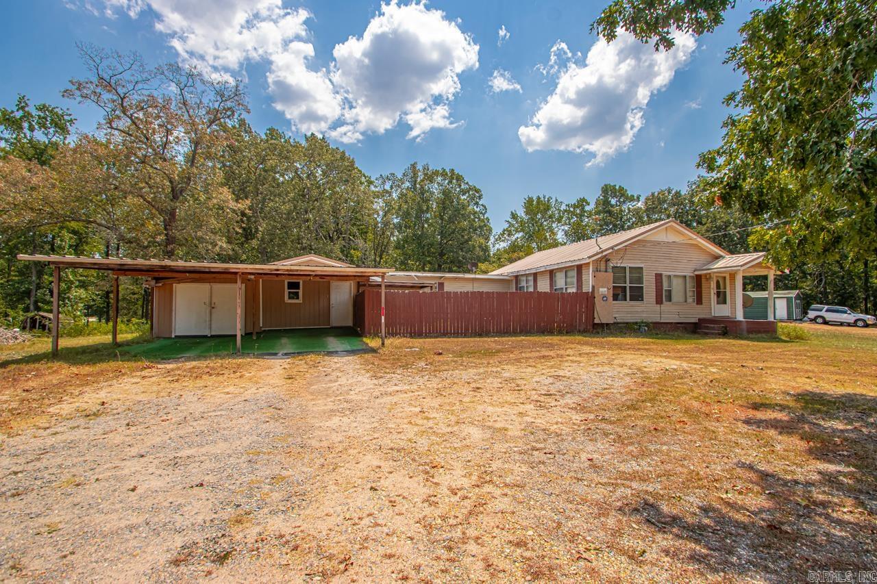 This home offers the perfect balance of space, privacy, and potential! Featuring 3 bedrooms, 1.5 baths, and a flowing layout with a great living room, dining area, and kitchen, itās ideal for everyday living or entertaining. Sitting on 1.3 acres outside the city limits, youāll enjoy extra room to spread out and the freedom that comes with it. With a little TLC, this property can easily be transformed into your dream home or a smart investment. The carport adds convenience, and the large lot offers endless opportunities for gardening, outdoor activities, or future projects.