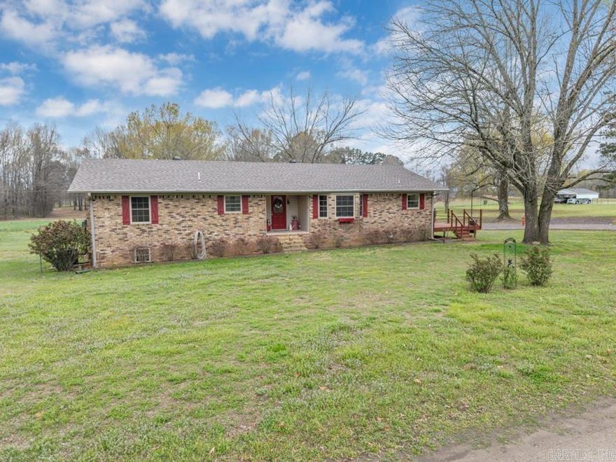 This remarkable property sits just 5 miles north of Morrilton off of Hwy 95!  One owner home. Spacious kitchen and all kitchen appliances convey. Large living room with portable gas log fireplace that will convey! All 3 bedrooms are adequate in size and both bathrooms have been updated! Separate laundry room. Roof is only 3 years old! There is also a large basement that is great for storage or also use as a storm shelter! 40x50 insulated metal workshop has electricity & water and a small living space with full bath. All of this on 1.5 acres just outside of town!