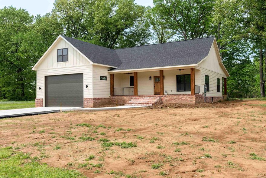 New riverfront home - taxes not yet determined.  4-bedroom, 3 full baths, open floorplan with cathedral ceilings, granite tops, highly durable flooring, nice dining room, a very large back covered deck, 2-car garage large enough for sprinter van...a quality build from start to finish!  The house is on one level except for a large bonus/bunk-room above the garage that has a full bath!!!