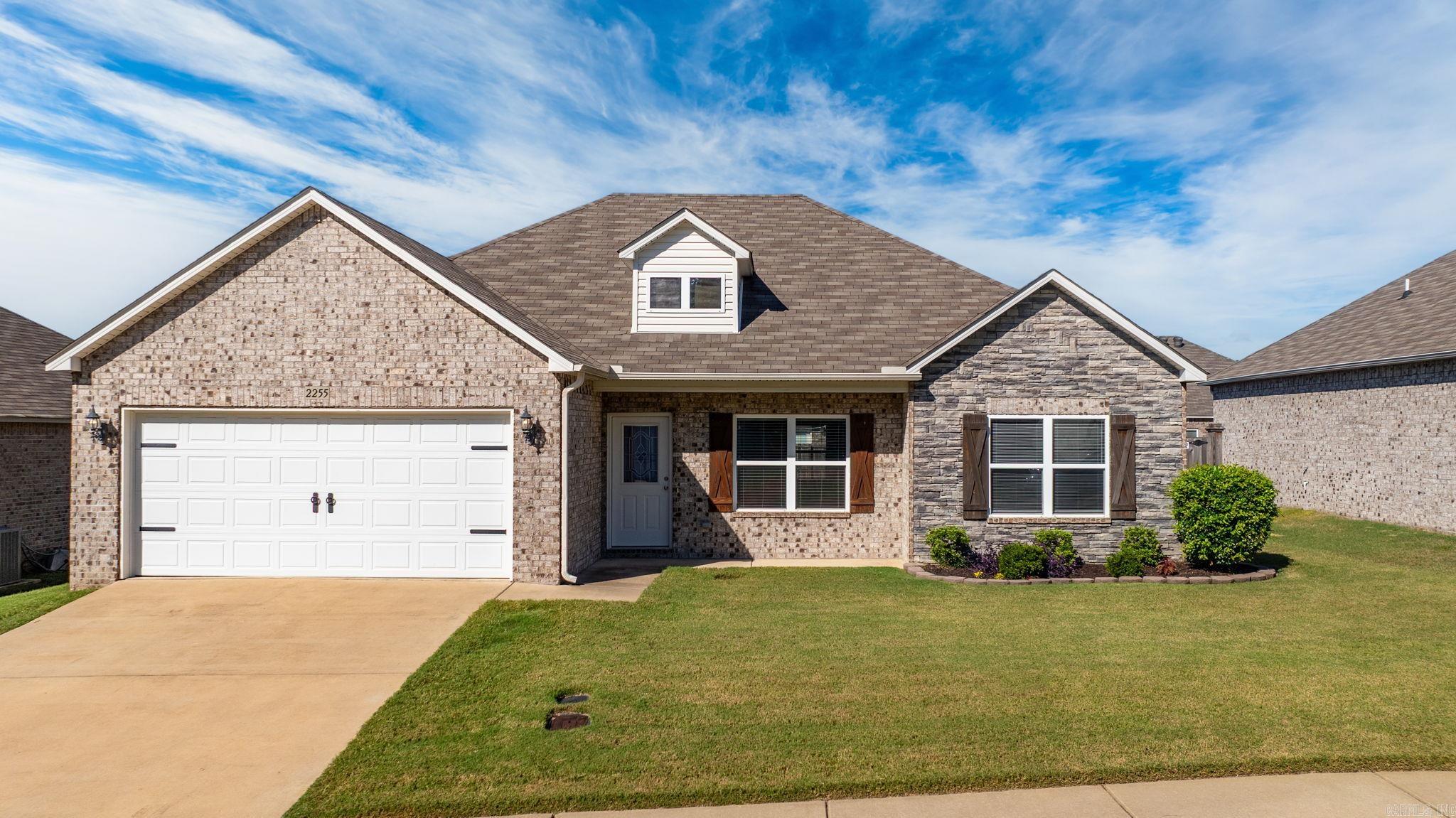 CHARMING HOME IN PRIME CONWAY LOCATION! This beautiful home offers a functional split floor plan with comfort and style throughout. The heart of the home is the kitchen featuring crisp white cabinets, stainless steel appliances, and an inviting eat-in area, perfect for gatherings. The spacious master suite includes a walk-in closet, relaxing tub, and walk-in shower for a true retreat. Additional bedrooms feature carpet for warmth and comfort, while LVP flooring flows through the living spaces for durability and easy care. Enjoy the convenience of a dedicated laundry room and the privacy of fenced backyard with a patio, ideal for entertaining or relaxing outdoors. Located in a sought-after area, this home has Conway Corp utilities and offers quick access to I-40, dining and shopping-making daily life a breeze. Don't miss your chance to own this wonderful home in a prime location! Call today for your private showing.