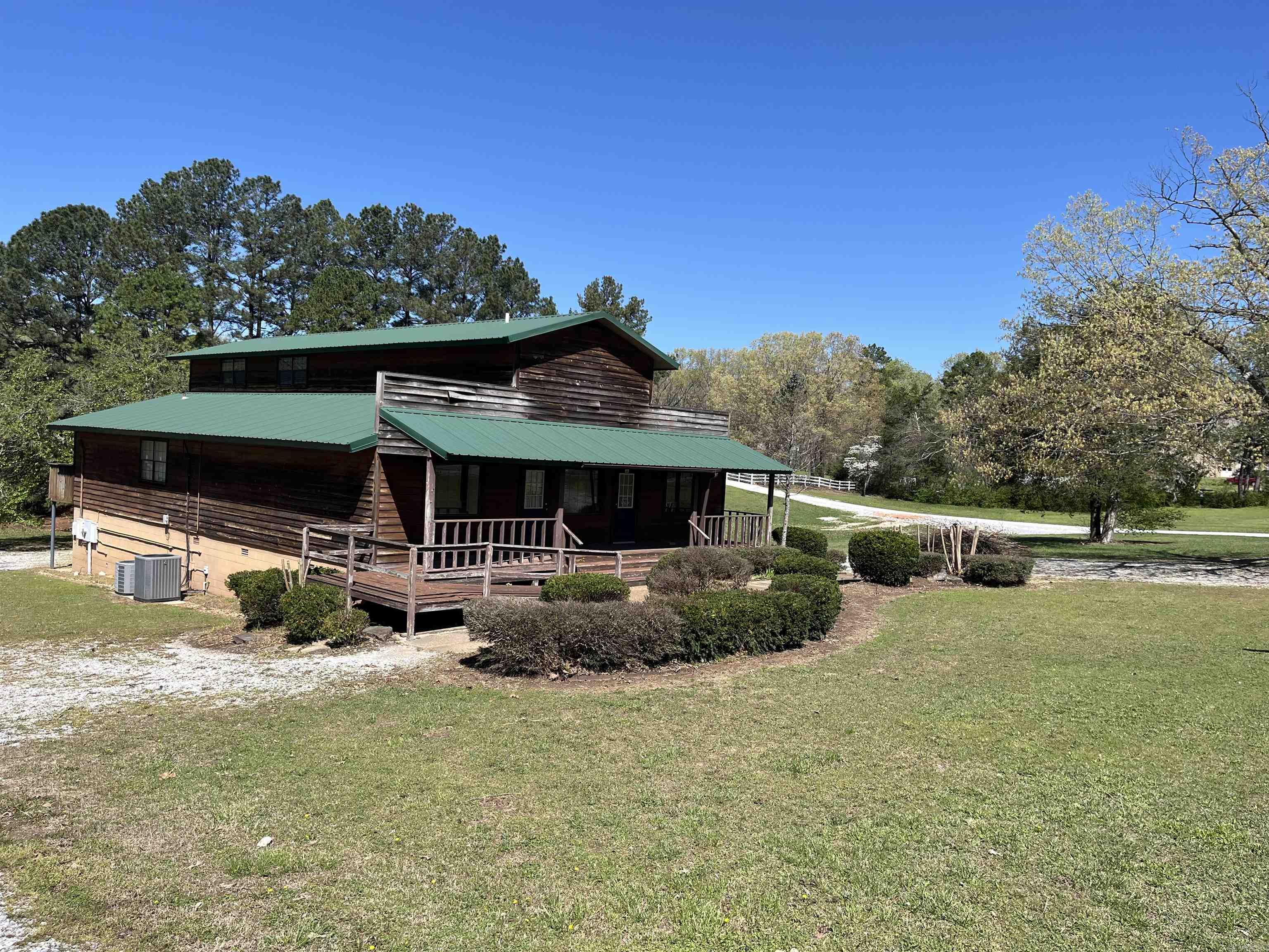 This multi-use property north of Mountain View on Hwy 5 is available to be purchased. It was built in 1985 and features 3360+/- sq. ft. sitting on 1.6 acres in a high traffic area. The main level was recently used as a doctor’s office so there’s waiting rooms, exam rooms, business office space, bathrooms and break room. Upstairs was used as an extension of the business office. It’s a large open space that includes a bathroom with walk-in shower. The property has potential for several value streams