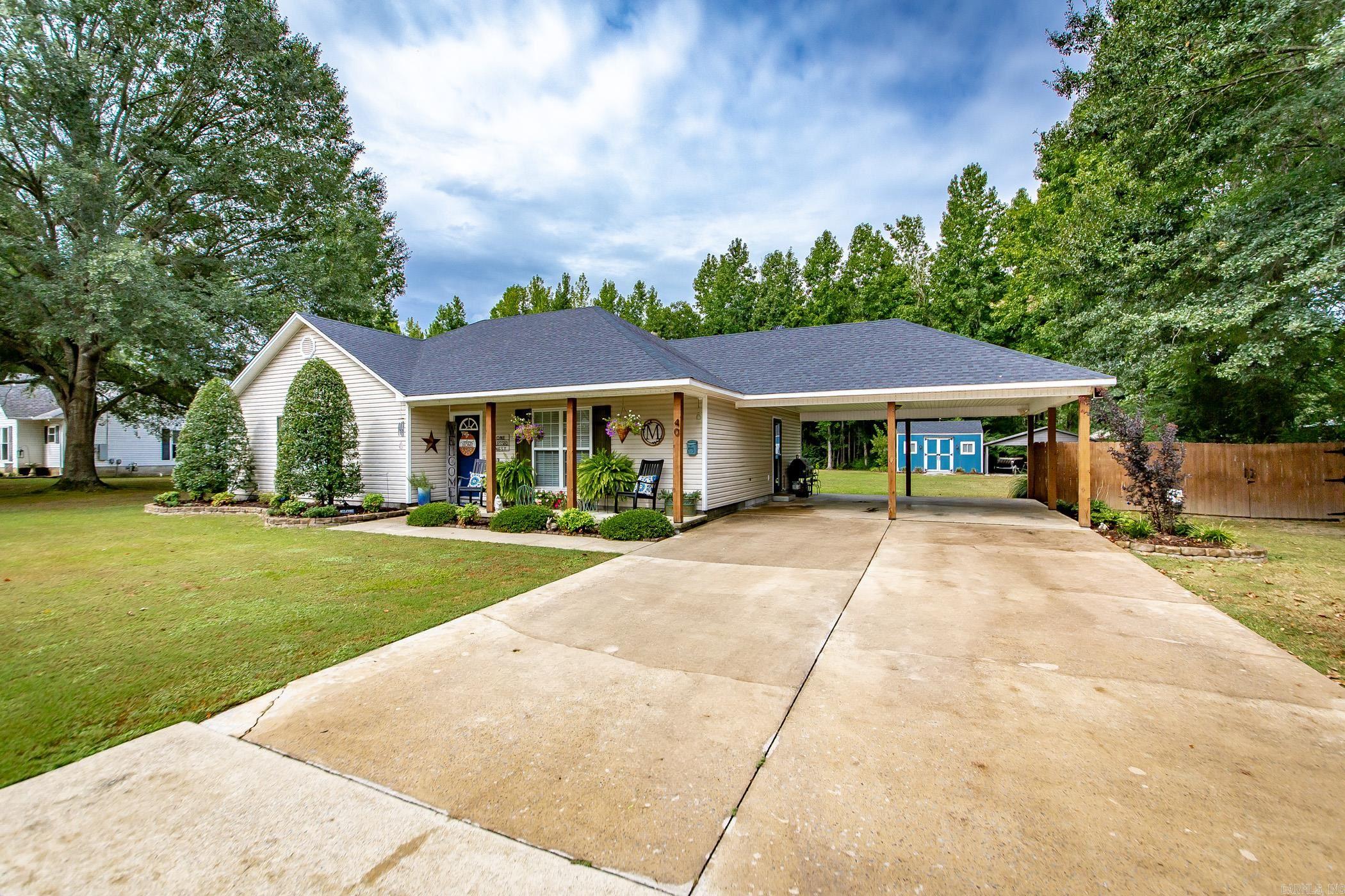 Welcome home to this charming retreat on a peaceful half-acre lot, where privacy and comfort come together. Backing up to green space, youāll love the serene setting and country feel, all while still being close to town. Inside, the open kitchen flows right into the living area, creating the perfect space for family time and entertaining friends. Durable LVP flooring adds style and function in the main areas, while soft carpet in the bedrooms keeps things cozy. With 3 bedrooms, 2 baths, and over 1,400 sq. ft., thereās room for everyone to spread out and feel right at home. Step outside and enjoy mornings on the porch, evenings in the spacious yard, and the convenience of extra outdoor storage. Full of charm and character, this home is the perfect place to slow down, relax, and enjoy the simple joys of country living. Call today to schedule your private showing.