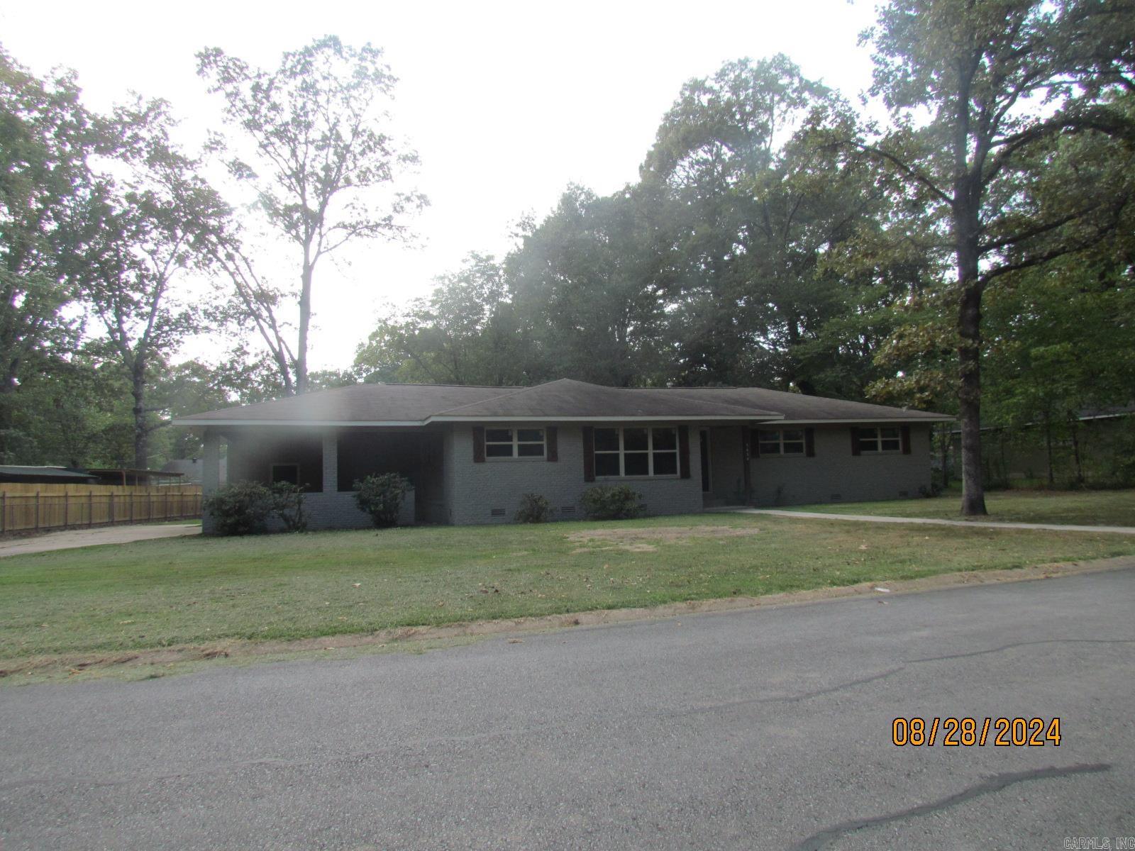 Beautiful move-in-ready home located close to city amenities, schools, and major employment just waiting for your family. Home has been completely remodeled: New roof: painted exterior Brick( beautiful Gray) and has vinyl trim for low maintenance & interior is painted with neutral colors; removed walls to open up; new flooring; new lights/ ceiling fans; added covered patio; new kitchen appliances; granite in kitchen, bathroom and laundry with glass tile backsplash; new windows that fold out for easy cleaning. It features open floor plan, formal dining room, Large living area open to breakfast area and kitchen and French doors leading to the wonderful covered patio. Beautiful luxury wood vinyl flooring through out home, large bedrooms, lots of closets, large laundry room with exit to large backyard and sink with granite. Both Bathrooms have been beautiful remodeled with the master featuring a large walk-in shower. It also features a shop with porch. This is one home you must see to know all the updates and amenities.