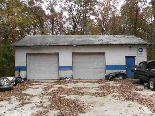 Would be a good location for impound lot, wrecker service or a service garage. Lots of room to grow or add a mobile home and have business and home together. Owner financing is available. Property is fenced. See agent remarks for code