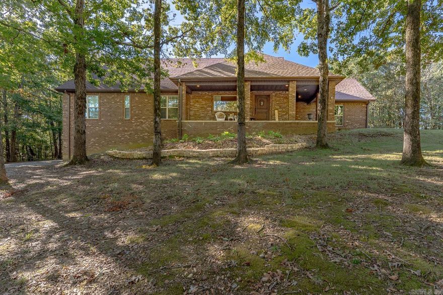 Welcome to Market 1056 County Road 476 in Jonesboro, Arkansas!  This stunning brick and stone estate is a rare find, offering beauty, space, and comfort on 2 acres surrounded by mature trees & amazing views!  Featuring 6 bedrooms, 3.5 baths, and 4,646 sq. ft. of beautifully finished living space. Step inside to find wood floors, a wood pellet fireplace, and a spacious living area with breathtaking views.  The main level:  offers a large kitchen with an extra-large refrigerator, wall oven, and plenty of cabinet space.  The master suite includes a walk-in shower & large closet. Enjoy morning coffee in the bright sunroom overlooking the deck, pool, and trees. Walk downstairs to the fully finished walkout basement with its own private entrance featuring new laminate flooring (installed 2020), a second laundry room, refrigerator, central heating and cooling, and a propane wall heater. Outdoor living shines here with a large covered front porch, relaxing back deck, and a well maintained Stealth semi-inground steel-wall pool.  Don't forget to see the 24x24x10 shop with ample space for hobbies, storage, or projects. Don't miss your chance to make this one-of-a-kind property yours!