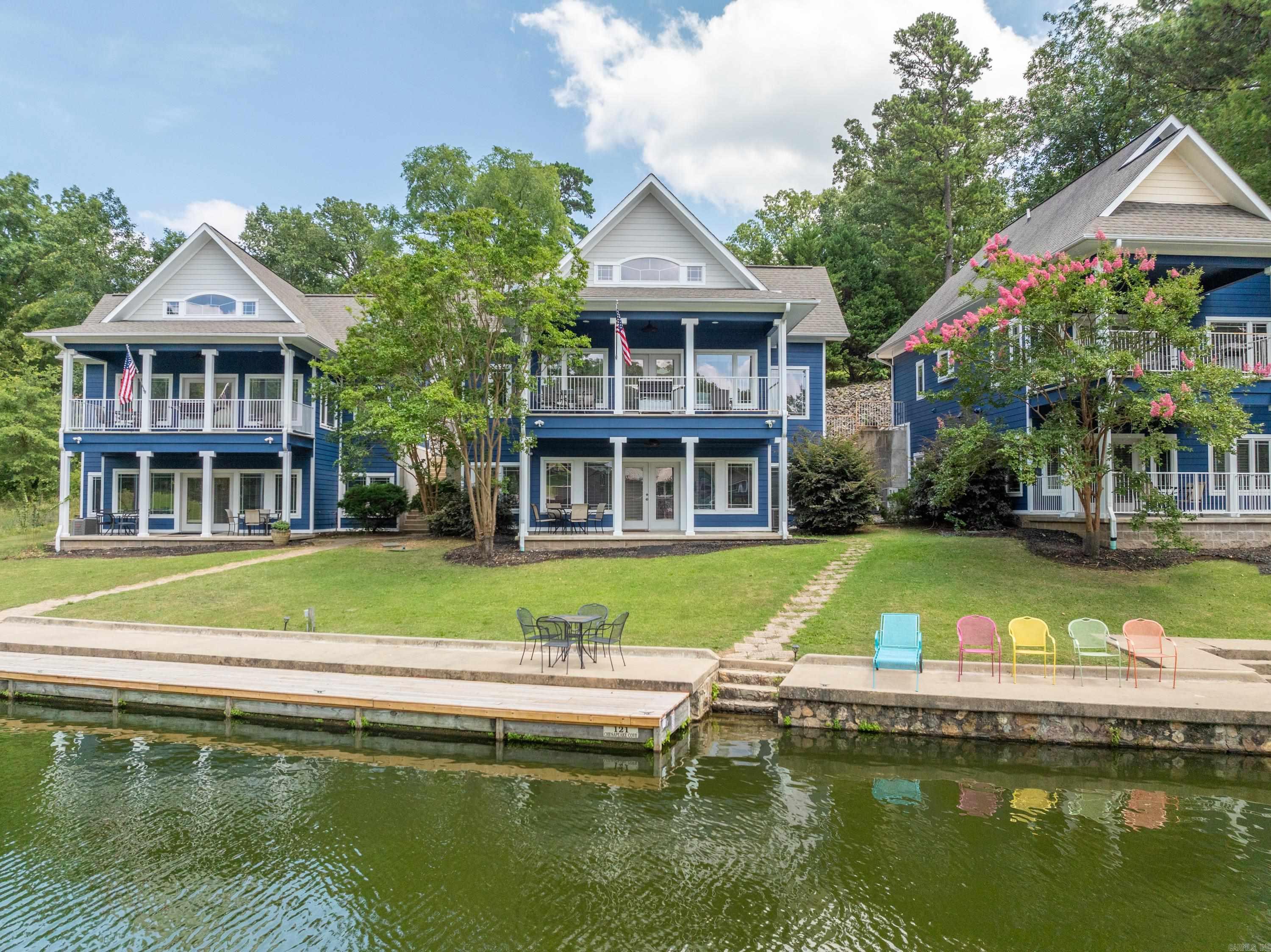 Discover the ultimate lakefront lifestyle with these three stunning homes on Lake Hamilton, nestled in the heart of Hot Springs, Arkansas. Currently thriving as short-term rentals, these properties present a unique investment opportunity with immediate income potential. Each home boasts a spacious and thoughtfully designed layout, perfect for accommodating families and groups: House 1 features 5 bedrooms and 3 bathrooms spread over 2352 sq ft, providing ample space for relaxation and entertainment. Houses 2 and 3 offer 4 bedrooms and 3 bathrooms each, with 2196 sq ft of comfortable living space per home. Situated in a central location, these homes are just minutes away from the best that Hot Springs has to offer. Enjoy close proximity to top-rated restaurants, vibrant marinas, and a variety of shopping options. For entertainment, the renowned Oaklawn Casino and Race Track is just a short drive away. Experience the beauty of Lake Hamilton right at your doorstep. The property includes a boat slip and a picturesque boardwalk, perfect for indulging in all your favorite lake activities- boating, fishing, or simply enjoying the serene water