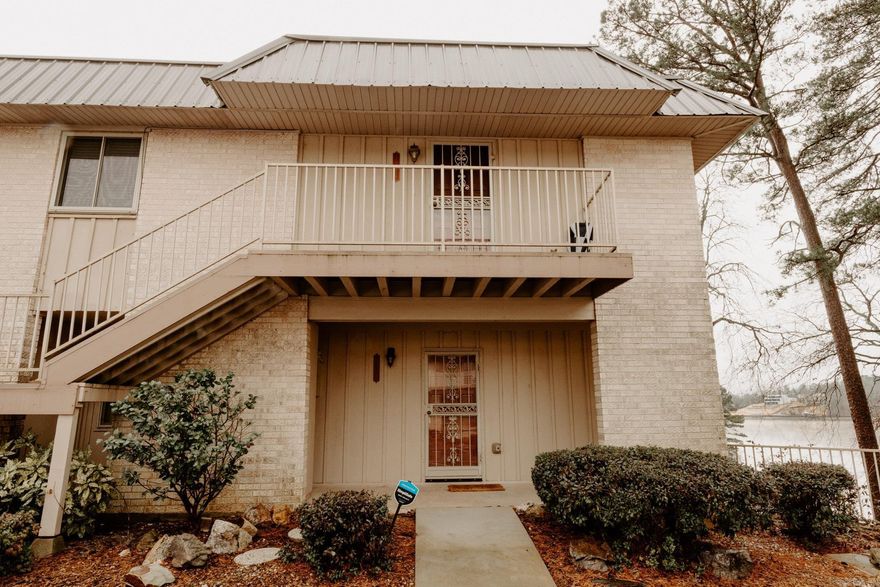 This 2-bedroom and 2-bath condo could be your next investment or your own getaway to Lake Hamilton just minutes away from Central Avenue. Located just off Higdon Ferry. Roof was just replaced this past Summer. Complex allows quarterly rentals in this private gated community. Home is coming to the next buyer fully furnished. Beds, refrigerator, decorations on the wall, living and dining rooms furniture and outdoor furniture that overlooks Lake Hamilton. You'll have a boat slip and complex has a community room and swimming pool at the point overlooking the lake. SEE AGENT REMARKS