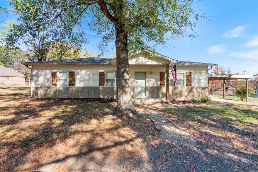 Looking for a home on Lake Conway on a large lot than this is the house for you! It has a view of the lake, a boat dock and a boathouse! Granted it will be several years before the water is back, but you will be ready with the perfect house on an improved lake. The yard is fully fenced. The house is in great condition. The roof over the covered porch has recently been replaced. Washer, dryer and refrigerator will convey. Tile and laminate flooring throughout. Granite countertops in the kitchen. Pantry. Lots 4-6 were purchased with the original listing which was only lots 1-3. New roof 12-23