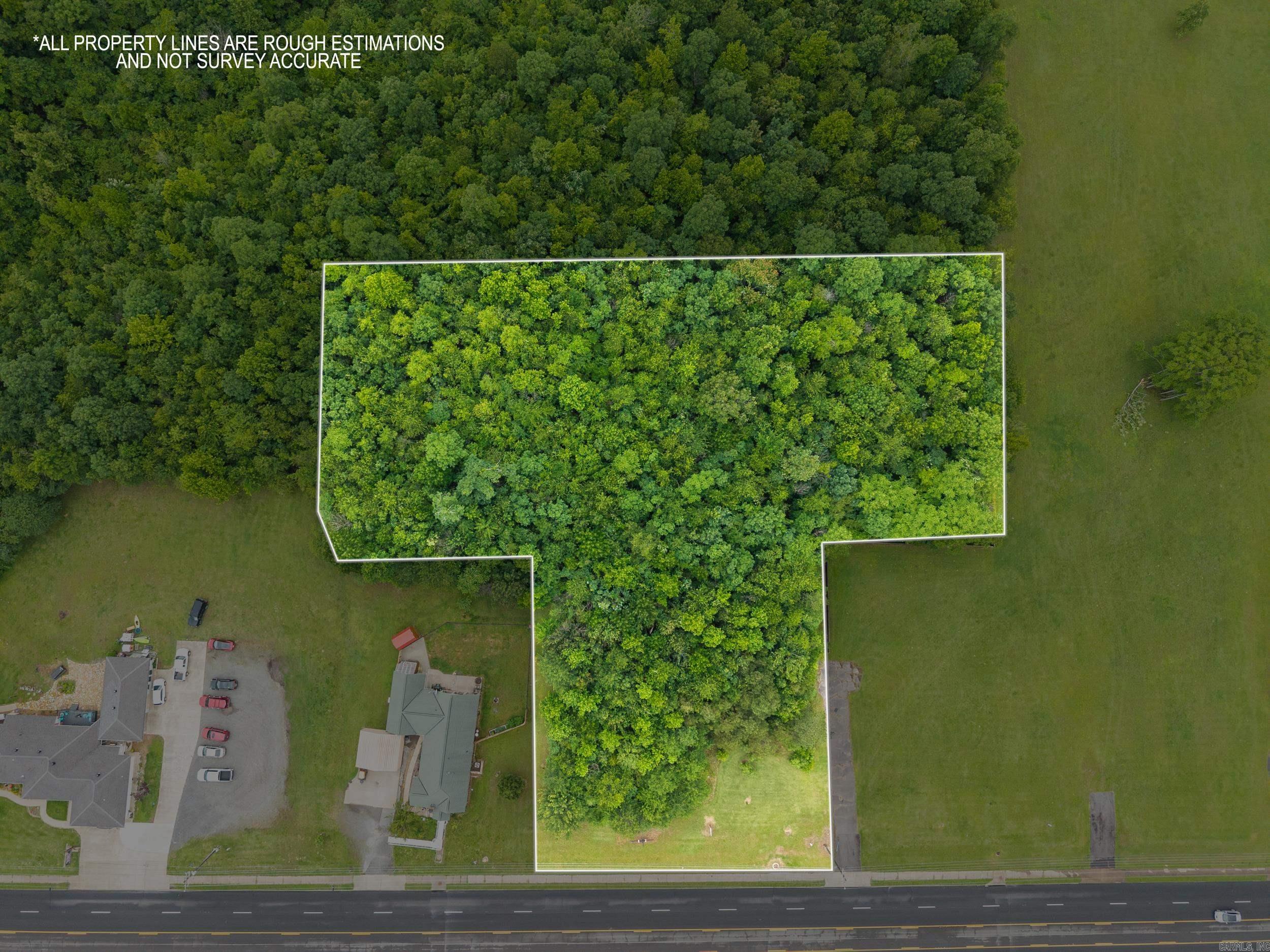 Central Location in Clinton. Level land with excellent highway visibility. Utilities available. Nice location for a restaurant, office, or shopping center. More land can be purchased. Comes with a fabulous view as well!