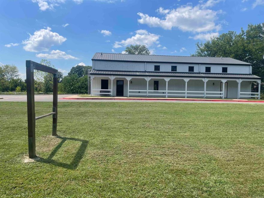 City has zoned for many uses.  Prime location for your event center, business, church, school or so many other opportunities.  Offering a kitchen, 1 full bath and 2-1/2 baths, office, a loft and large open area.  Interior has been recently painted.  Building is situated on 1.6 acres.