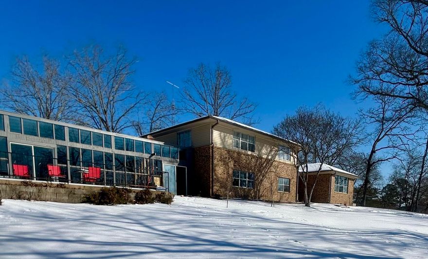 This beautiful, 4,000+ sq. ft. tri-level home features 5 bedrooms, 3.5 bathrooms, indoor swimming pool, all nestled on nearly 5 acres of private land in Royal just off Hwy 270. Outside city limits, the property offers endless possibilities - ideal for hobby farming or future business development. A large shop/garage adds extensive storage and workspace for projects of any size.