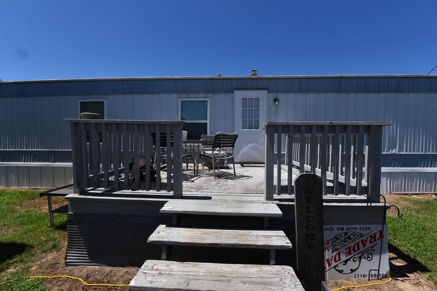 Welcome to your potential new home or investment opportunity in the heart of Greers Ferry, Arkansas! This charming mobile home is a perfect blend of comfort and convenience, boasting recently installed luxury vinyl flooring that adds both durability and a touch of modern elegance to the living space. Nestled amidst the stunning backdrop of picturesque mountain landscapes, this property offers not just a home but a lifestyle enriched by nature's beauty. Just five minutes away, the sparkling waters of Greers Ferry Lake invite you to indulge in a variety of recreational activities—boating, fishing, swimming, or simply soaking in the scenic views. The nearby City Park further enhances your outdoor options with well-maintained spaces ideal for picnics, walking, and family fun. This versatile property is also equipped with electric and septic hookups, making it RV-ready or perfect for adding another mobile home. Whether you're considering expanding living arrangements for family or offering a rental space, the possibilities are endless.