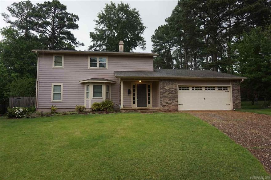 This west Little Rock home is located in Echo Valley. It has a fenced back yard and a two-car garage. The master suite is downstairs and upstairs are three large bedrooms and full bathroom. The house has central heat and air, ceiling fans, window coverings, and washer/dryer connections. The kitchen is furnished with refrigerator, electric stove, microwave and dishwasher. The tenant will pay gas, water, and electric, and be responsible for yard care. Pets are allowed with owner approval. Please, no smoking.