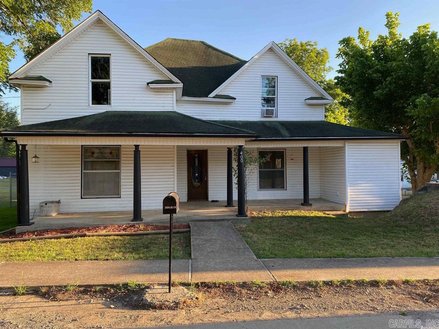 Being sold “As Is”, This 4 Bedroom 2 Bathroom home is in town, close to the Library, built in the late 1800s, to early 1900s, on .25 acre M/L. Original front door, beautiful carving around beveled glass. Vinyl siding, updated wiring, along with new cabinets and countertops, as well as new plumbing . New flooring on the second floor. Linoleum downstairs is 6 years old. New French door leading to large covered back porch. Fenced back yard for animals and parking. There is a Storage Building outback. A Storm Shelter is in the front yard.  New Central heat and air downstairs, window units upstairs.  This home is approximately 10 miles to the Buffalo River at Silver Hill/Grinders Ferry, approximately 20 miles to Dillards Ferry and within a short distance to Blanchard Springs Caverns.  It would make a nice residence or nightly rental, on a quiet street.