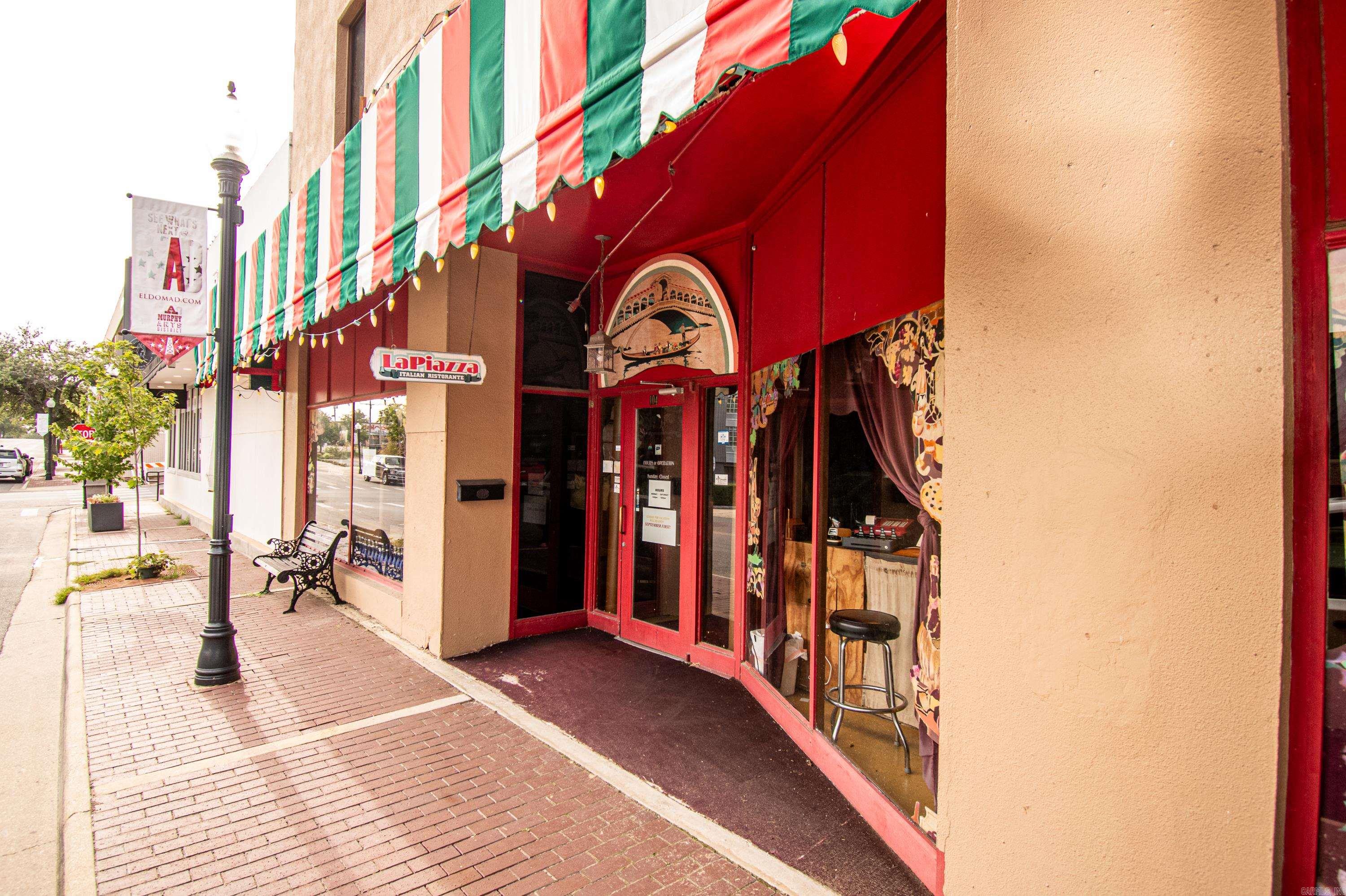 Located in the heart of historic Downtown El Dorado, this versatile 8,960 sq. ft. building is a prime investment opportunity. The property features two distinct businesses: 1. La Piazza: This vibrant restaurant occupies the lower level and is leased through March 15, 2026, with a monthly rent of $2,033 for 9 months (tenant is responsible for utilities). Note: Restaurant equipment is not included in the sales price. La Piazza operates seasonally, closing June through August. 2. The Randolph Events Venue: Positioned on the upper level, this space is available for daily rentals at $500. Ideal for a range of events, it is a profitable addition to this dynamic property. Each unit includes 2 restrooms, enhancing convenience for both tenants and guests. Donāt miss this unique opportunity to own a prime piece of historic downtown real estate with stable rental income and event hosting potential.