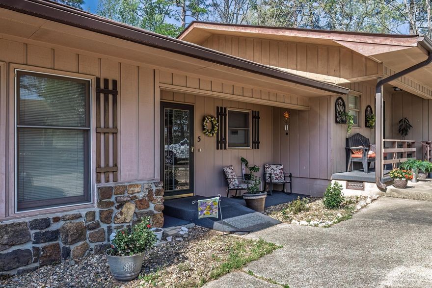 Single level two bedroom and two bath townhouse. Walk in shower in master bath. Fresh paint and no popcorn ceilings. Completly covered deck.New heat and air, August 2023. New water heater in 2019. New roof 2018. New stove and refrigerator. All of the big ticket items have been taken care of. Current termite policy. Internet from AT&T. Hot Springs Village Property Owners Assn. dues are $113.19 a month. Townhouse Assn. dues are $100 a month. New property owners are subject to a "one time" HSV POA buy in fee of $2000 collected at closing. No showings on Wednesdays. Agents, see remarks.