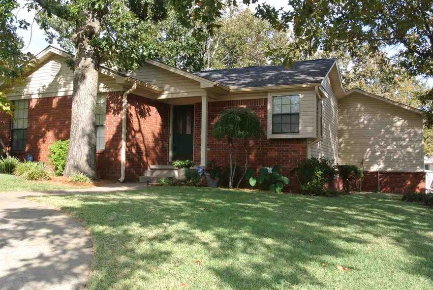 Updated home in the heart of Sherwood! Living room with vaulted ceiling and brick fireplace. Lovely roomy kitchen with prep island. Hardwood in entry, living room, and hall, ceramic tile in kitchen and baths. Large master bedroom, don't miss the nice corner windows! Roof and Heat and Air conditioning replaced recently. Large nicely landscaped front yard. Large deck overlooking back yard. Seller must remove dogs for showings. Please make appointments in advance.