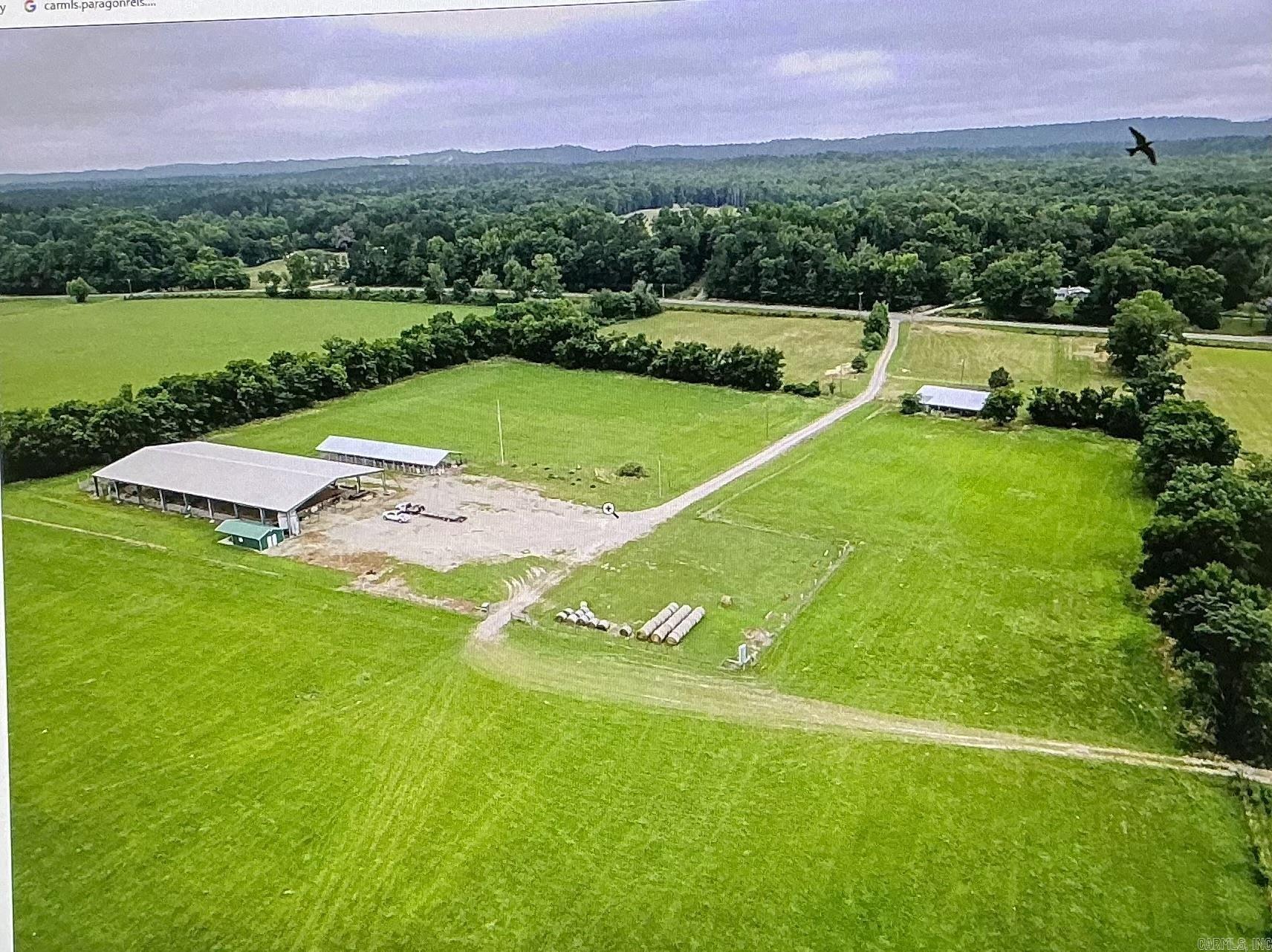 The RanChan Arena is A premier working cattle & horse ranch with approx. 50 acre of premier and seasoned pastures and a state of the art 100'x200' covered steel truss arena. RanCher arena has had numerous competitive sports, that includes Equestrian obstacles, Team Penning, Ranch Sorting, Barrel Racing/pole bending just to name a few. The arena features state of the art LED Lights, and sound system, laser pointers for precise placement of barrels & poles without having to measure again, And a announcer booth with lots of extras to help your events run smoothly. It also has 4 cattle holding pens on the backside of the arena. A fully operational Snack Shack with covered patio two outside access restrooms just to the side of the arena. Located on the other side of the arena is a 36'x120' 24 stall covered horse barn, with lights, electricity, and water & dusk to dawn lights on each end. There are 18 RV hookups with 50/30 amp and 110 electrical hookup for each spot, as well as water hookups for all. The second horse barn features 9 additional stalls, of which 6 are enclosed and 3 are under roof, a wash bay, tack and feed room, storage room, office with restroom, a machine shop room.