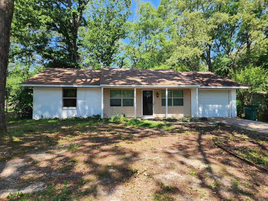 This home has recently had a french drain added around the back and side- and foundation repairs to the kitchen, back patio, and garage/living room wall. The foundation work has a transferrable warranty for the buyer. All kitchen appliances will remain. Interior of home needs sheetrock repair.