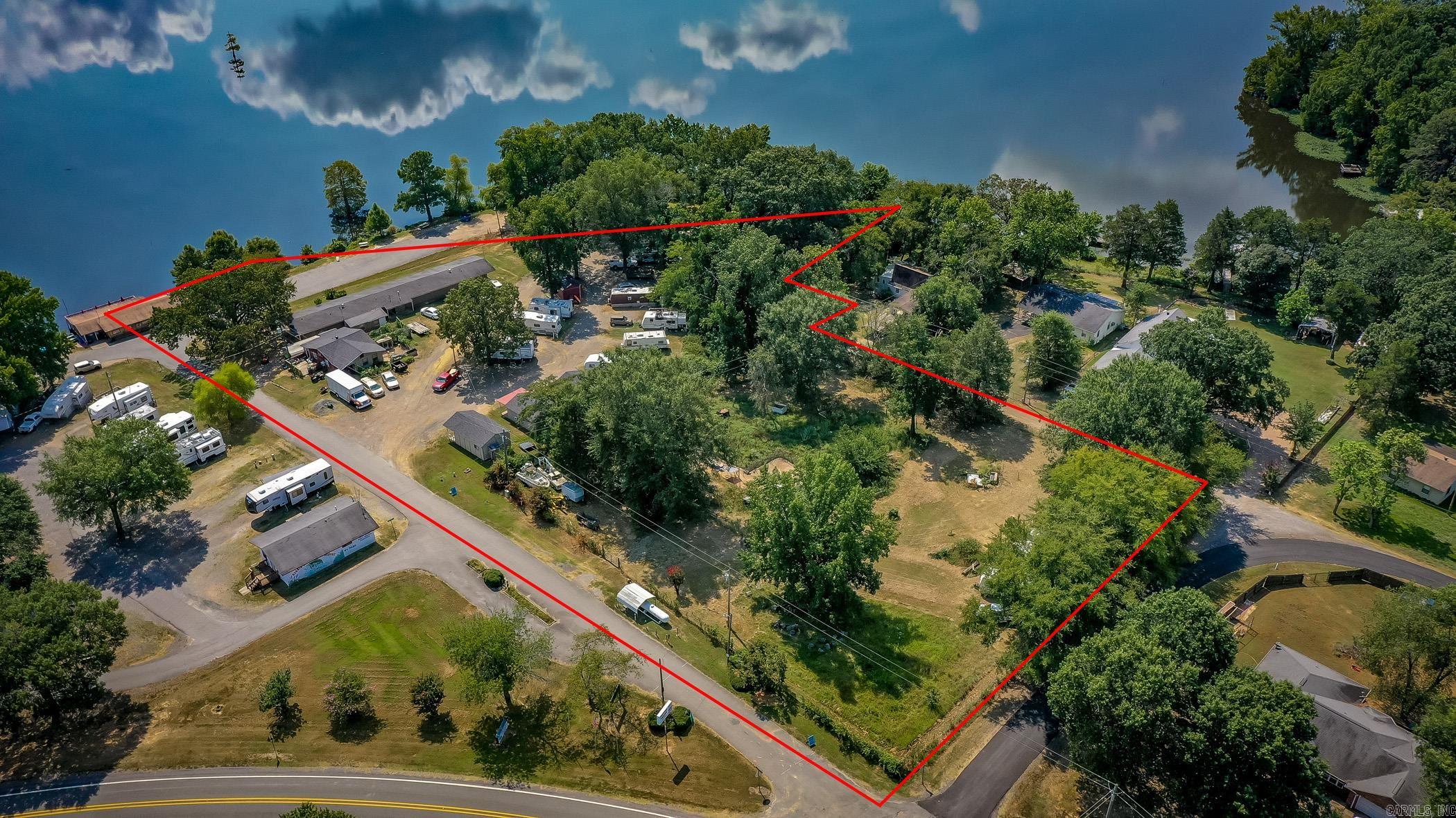 Unique Commercial Opportunity on Harris Brake Lake This one-of-a-kind property offers multiple income streams and a prime lakeside location. Features include: 1) Retail store directly on the lake, 2) Motel with 8 units, all facing scenic Harris Brake Lake, 3) Four charming cottages, 4) Laundry and restroom building for guest convenience, 5) 15 RV trailers included in the sale, 6) 40 RV parking spaces for additional guests or rentals, 7) Propane Refill. Whether youāre looking to operate your own hospitality business or invest in a versatile income property, this is the one youāve been waiting for!