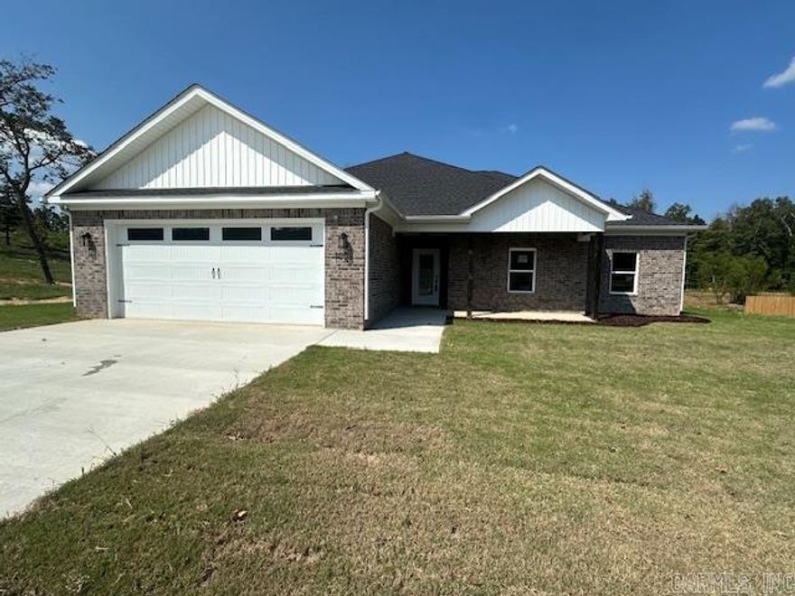 Welcome to this charming new construction sitting on 1.28 acres located in Winchester Estates. This 4-bedroom, 2-bathroom home backs up to serene woods where you can sit on your back porch drinking your morning coffee and watch the wildlife roam around. Home features an open/split floor plan that is designed for comfort and functionality. Luxury vinyl flooring throughout, ss appliance, and large  island in the kitchen perfect for entertaining. The primary suite features a his-and-hers walk-in closets, and a soaking tub. Located perfectly between Little Rock and Bryant! Bauxite School District!! SELLER IS OFFERING $5000 IN CONCESSIONS WITH AN ACCEPTABLE OFFER!!