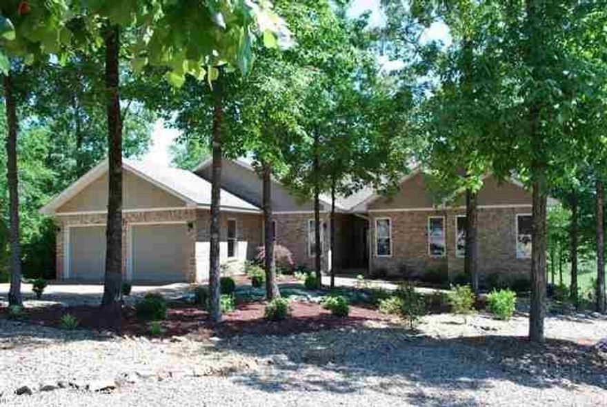 Fabulous View on Magellan! Contemporary Update!   You'll enjoy new hand scraped hardwood floors, granite counters throughout.  A brand new kitchen offers high end appliances including an induction range.  Lots and lots of updating, too many to list---check out the new fireplace and surround, tiled walk-in shower master suite.   So many new things to excite the eye!  The view down #7, #8 and the pond from the sunroom is remarkable.  New landscaping and drip system added.  Talk about a facelift! Wow!