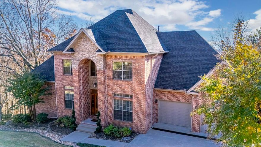 Discover the epitome of modern living in this immaculate four-bedroom, three-and-a-half-bath home and additional bonus room or possible 5th bedroom.   Revel in breathtaking views from the back Trex deck system with contemporary metal railings and partially covered with an awning for shade on sunny days. The interior boasts new vanities, fresh paint, and an updated fireplace, creating a cozy yet contemporary ambiance. Indulge in the luxury of expansive walk-in closets in every bedroom.  Abundant attic space, including a generously floored area, provides ample storage options. This property has been meticulously maintained by its original owner.  Updated HVAC units, full house hot water circulation pump and recently replaced roof show how well this home has been cared for. The location to all the amenities of West Little Rock while still having amazing green space privacy and an oversized lot makes this home one of a kind.  Experience a harmonious blend of style and convenience in this remarkable residence.