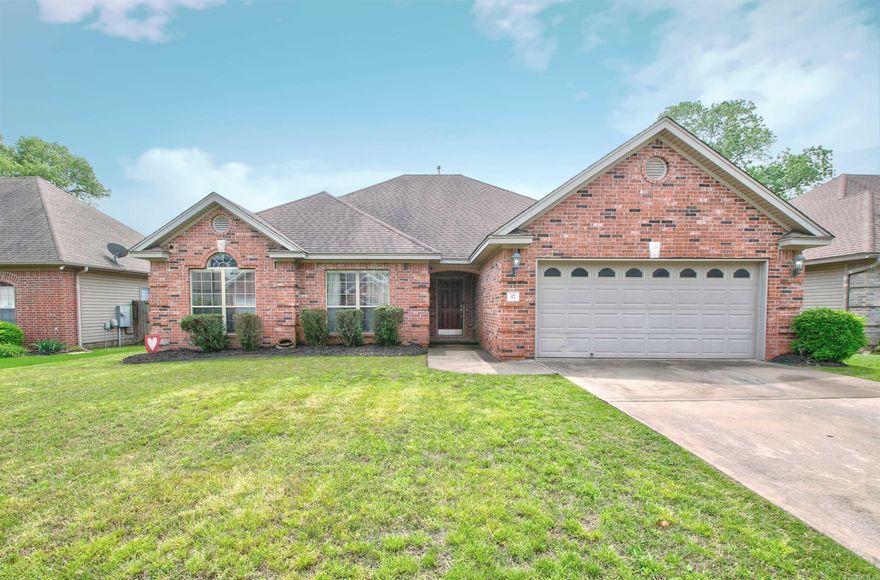 Beautiful Home in the gated Bentley Court Addition of Otter Creek! Easy access to I-30 and I-430 and just 5 minutes to the Outlet Mall. Home features an open floor plan concept which features beautiful crown molding and trim throughout, recessed lighting and gas log fireplace. All rooms are good size. Very spacious kitchen/dinning combo with cabinets to store everything you need! Kitchen also offers a breakfast bar, all stainless steel appliances, pantry area and dinning area. Master bedroom offers tray ceilings, jetted tub, walk-in shower and large walk-in closet. Full fenced level back yard with covered patio and a 12x12 storage building.  Come see!