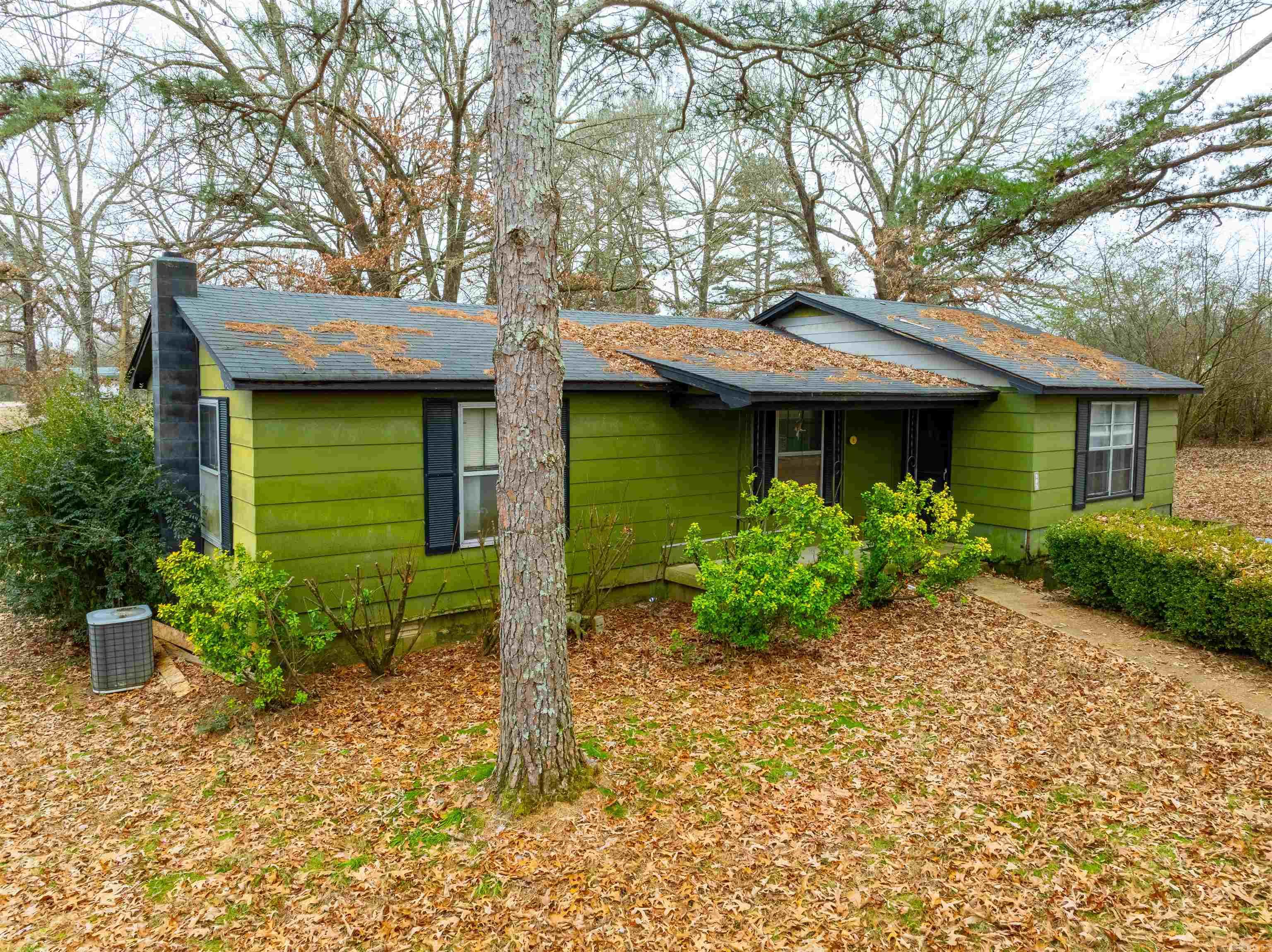 Charming Fixer-Upper on 2 Acres – Strawberry, Arkansas Looking for a property to remodel and make your own? This cozy home, situated just outside the charming town of Strawberry, Arkansas, on Highway 230, is full of potential and waiting for a new family to bring it back to life.  Key Features: City Sewer and Water: Convenient utilities make remodeling or building even easier. Wooded Lot: The property offers privacy and natural beauty, creating a peaceful setting. Outbuildings: Multiple outbuildings on-site offer storage and project opportunities, though some may need repair. This property sits on approximately 2 acres, providing ample space for various possibilities:  Remodel the existing home and make it your own. Build a new home while keeping the current one. Create a multi-family setup with room for a parent or kids to live nearby. This desirable location offers the perfect combination of small-town charm and practical features like city sewer, giving you endless options for customization.