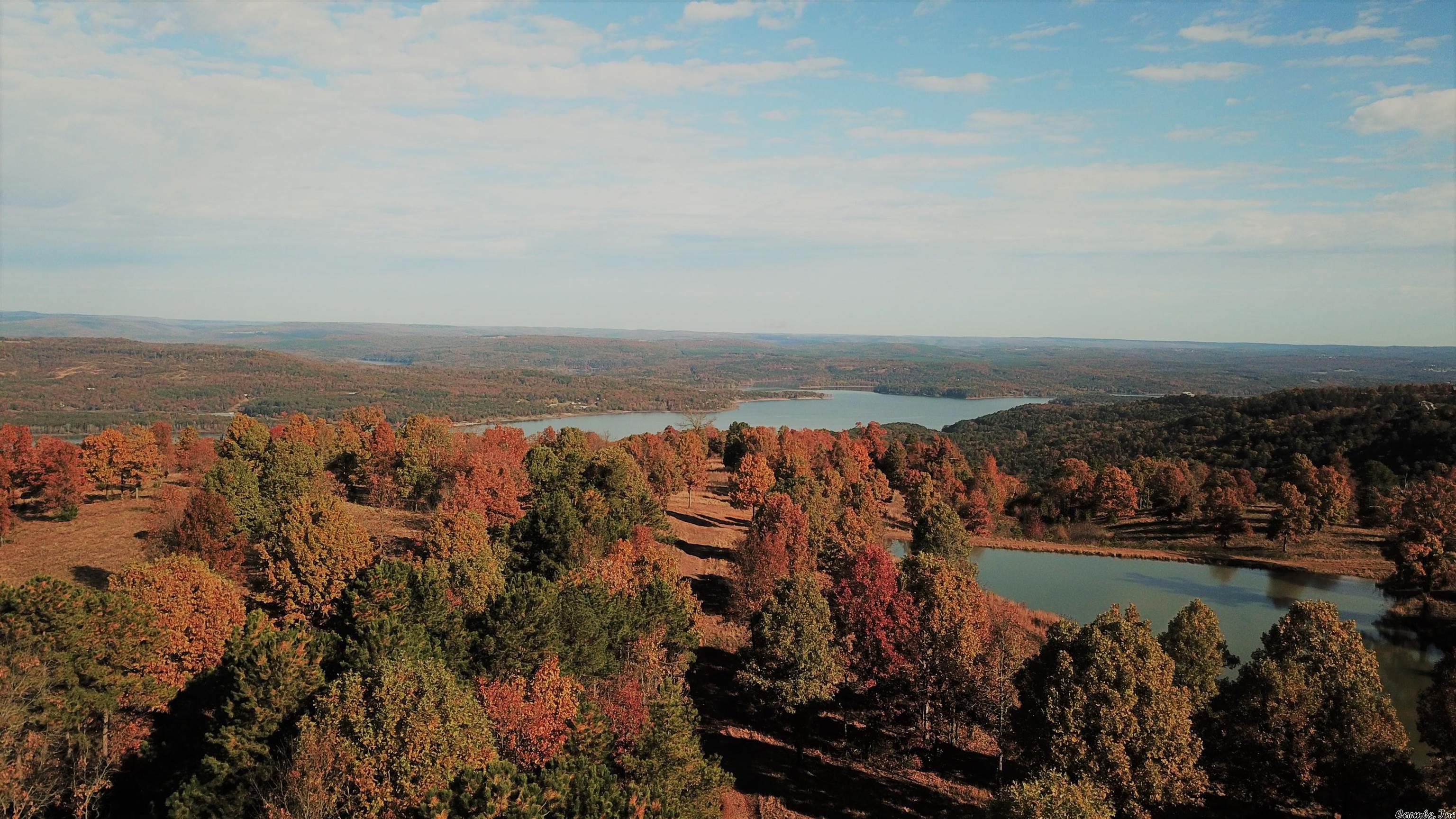 This 354 +/- Acre property has lake view development written all over it. Located right off the black top, barely an hour from Little Rock and only ten minutes from Clinton, AR. This tract features a large mountain top plateau that overlooks Greers Ferry Lake. The view this property offers is truly a must see, words can't explain the sense of peace you feel from a sight such as this. With utilities at the road, this would be a good place to develop into lake view homes or a place to call your own.