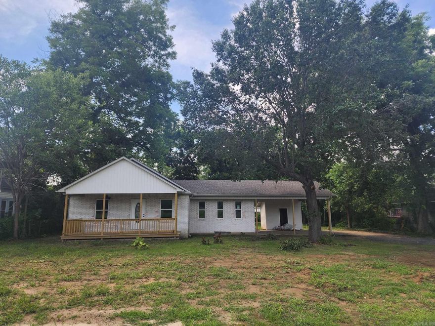 Do not miss this adorable completely remodeled home that sits in the heart of downtown Beebe. This 2 bedroom 2 bathroom home features granite counter tops, valued ceilings, luxurious large plank laminate flooring, a covered front porch and a covered carport for 2 vehicles. Look no further if you are looking for a great priced RD eligible property or a C-2 zoned office space, small boutique or hair salon space. This property can fit any need.