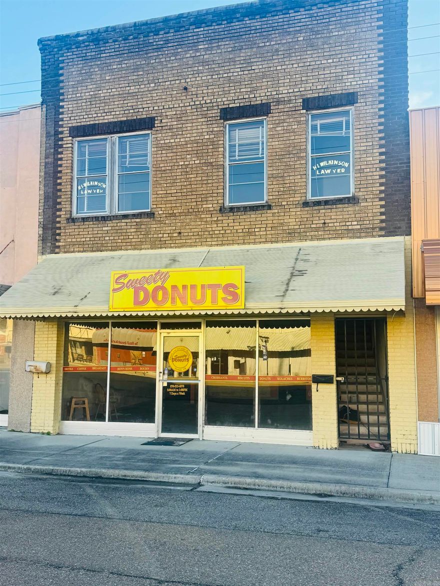 Endless possibilities await in this versatile vacant commercial building, ready for your next business venture. The spacious downstairs offers plenty of room for retail, office, studio, or service use and includes a full bathroom for added convenience. Upstairs presents the perfect opportunity to create a private apartment, executive suite or additional income producing space. Whether you're an investor, entrepreneur, or visionary this property provides the flexibility to bring your ideas to life in one dynamic location. Unlock the potential and make it your own.  property being sold as is where is. Sq footage, lot size, and age taken from courthouse records.