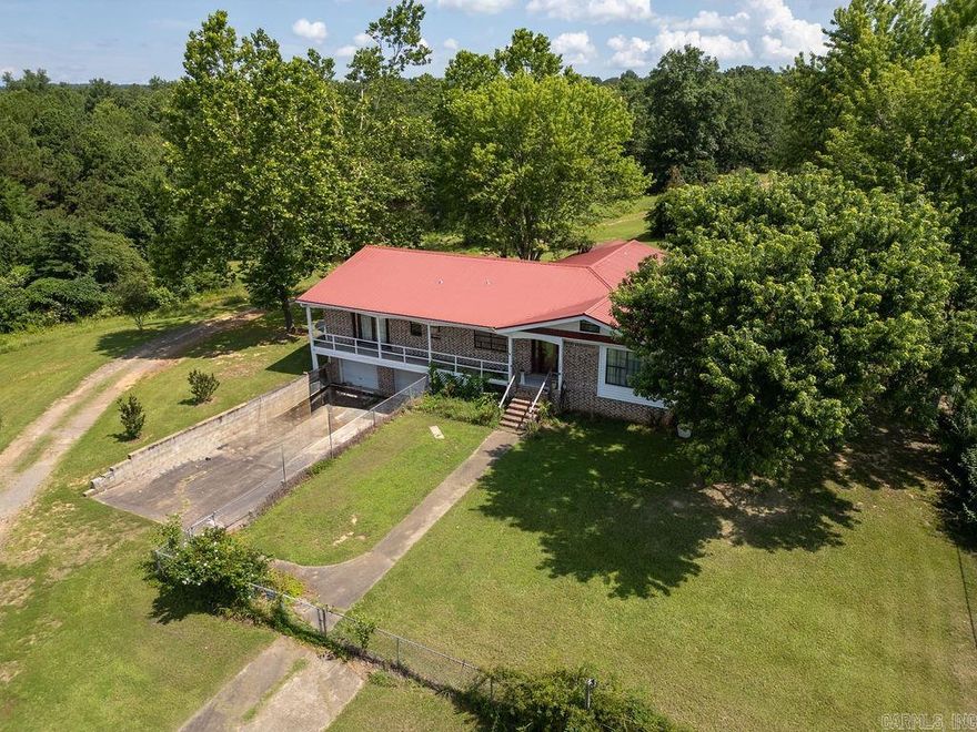 Embrace true farm life on this peaceful property with woods and a pond. This 4-bedroom, 2-bath home includes a full basement and a shop with a concrete slab and electricity—ideal for fixing equipment, storing tools, etc. You’ll have plenty of room for livestock, a big garden, and direct access to nature. More acreage is available
