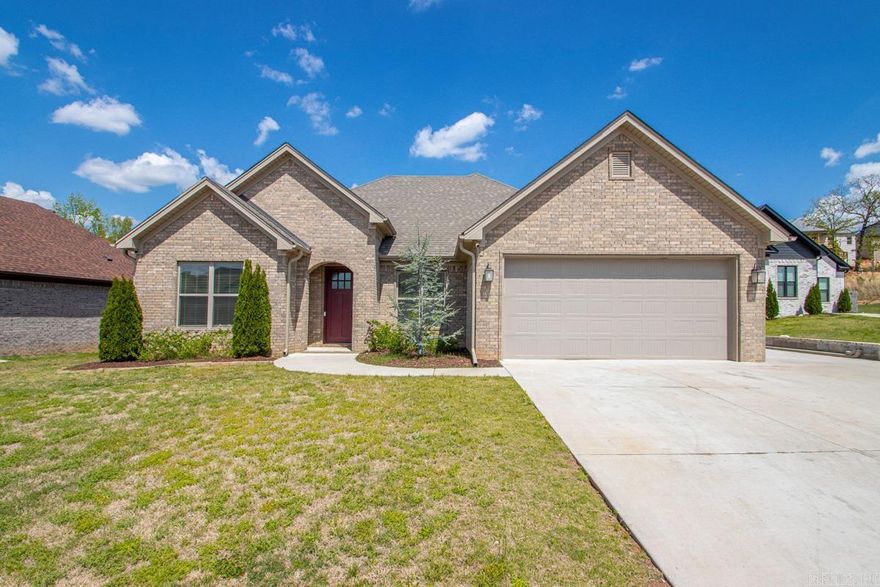 Beautiful newer construction home with an open floor plan, high ceilings, and abundant natural light. Spacious living area with fireplace opens to a stylish kitchen featuring a large island, custom cabinetry, and great workspace. Private primary suite offers dual vanities, soaking tub, tiled shower, and large walk-in closet with built-ins. Generously sized secondary bedrooms and functional laundry room with storage. Enjoy the oversized screened-in back porch overlooking the fenced backyard. Detached 30x30 shop with 12x30 loft provides excellent space for storage, hobbies, or additional parking. Move-in ready with great style and functionality.