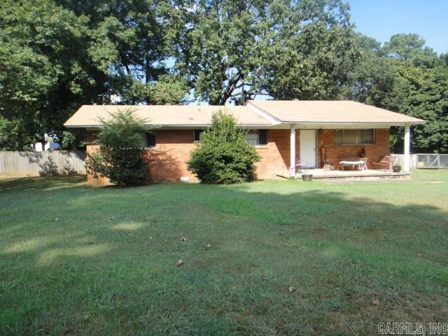 This home is close to shopping, college, hospital. Cozy spaces inside. Kitchen has a wall over and surface range with breakfast bar. There is a nice size back yard with mostly wood fencing. Great for first time home buyer or investment.