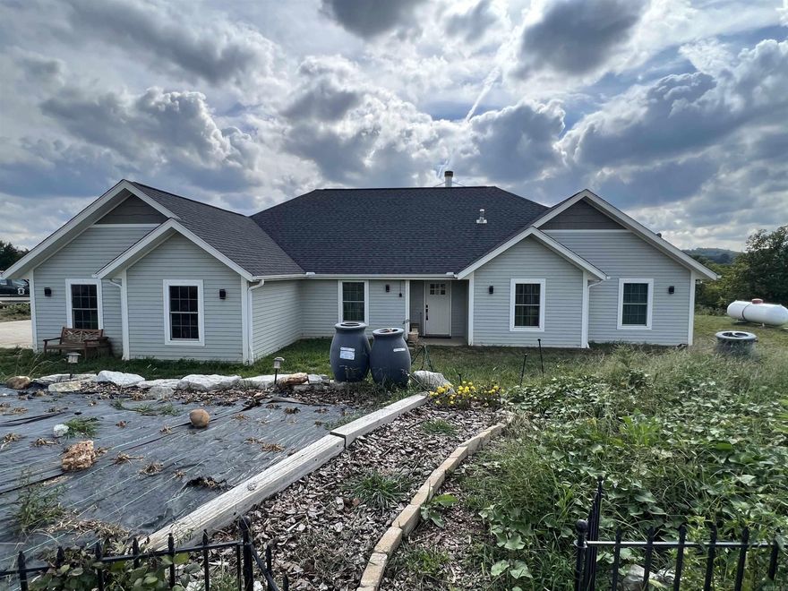 Great Ozark Mountain homesteaders mini farm. Come check out this 5 BR, 3.5 BA, 2,141 SQFT, 2 car garage, and 6.71 acres m/l. The home features granite countertops, wood fireplace, wood stove location, walk-in closet, pantry, and much more. The land is all in fenced pasture for livestock and has a 30’ x 40’ metal shop with concrete floor and electric. Call today to schedule a showing.