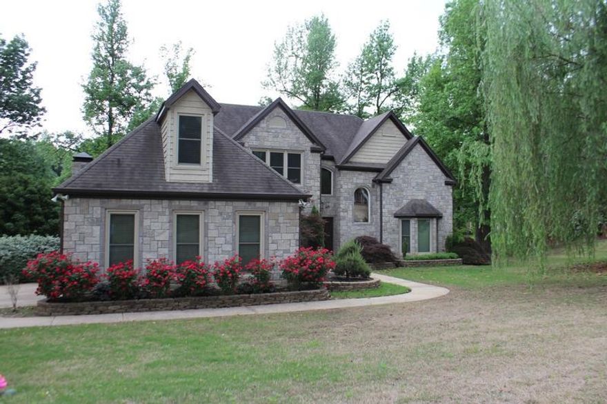 Gorgeous home w/stone exterior & many updates throughout. No detail has been missed in this immaculate home. Chef's kitchen boasts luxurious cabinetry, granite counters, breakfast bar & wall ovens. Main level master w/walk-in closet & relaxing bath w/jetted tub, dbl vanities & walk-in shower. This home has been equipped with Control4 Home automation system w/integrated lighting, climate & audio/video control. Other amenities include laundry room w/utility sink, extensive landscaping & two car garage.