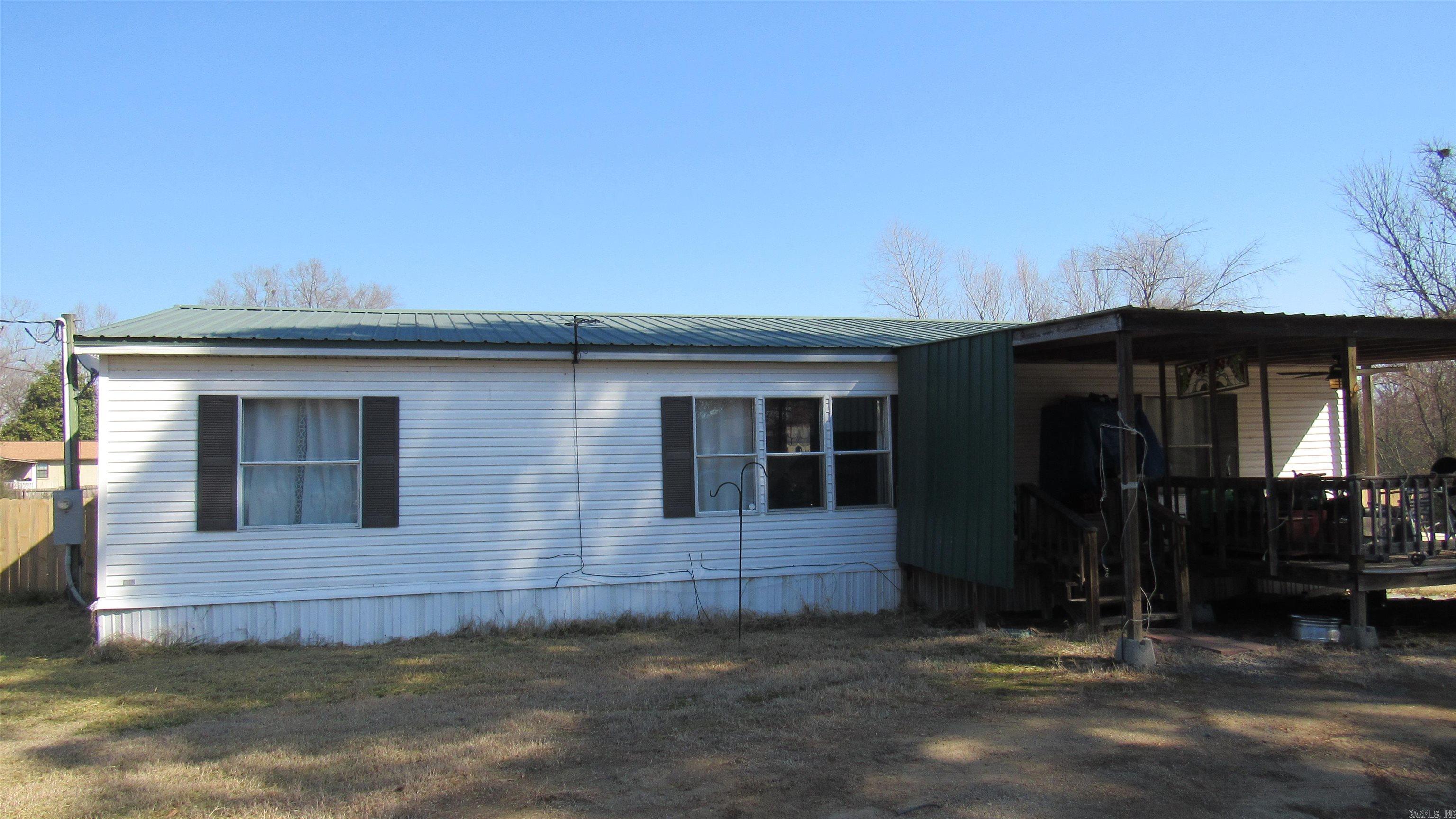 Rural property near Lake Conway with 4 bedrooms and 2 baths. The Property has a new Wooden privacy fence for the back yard and on a level lot. The storage building does not convey. Sold "AS IS" by seller with no Disclosure. Note: square footage and lot size are approximate measuring encouraged.