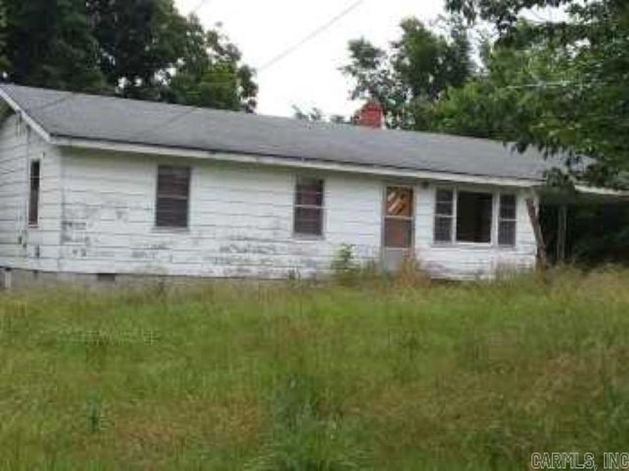 14 Acres in Big Flat with 960 Sq.Ft. Dwelling and old barn.