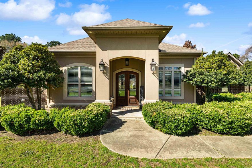 Centrally located home on 4 scenic acres with a pond, this thoughtfully designed property offers space, privacy, and custom finishes throughout.  The formal dining area connects seamlessly through a buffet and pantry to the kitchen. Entertain easily with a commercial fridge/freezer combo, dual ovens, wine fridge, eat in nook and desk area for managing daily life. All overlooking the living room anchored by a beautiful stone fireplace, rich hardwood floors and archways. The split layout features Jack-and-Jill bedrooms on one corner, a private guest suite with its own bath on another, and a spacious primary retreat tucked away with a dual vanity & seating area, free standing tub, custom shower, and an oversized walk-in closet.  Additional highlights include a private office with storm shelter, large locker space and laundry room adding to the home’s design. There is foam insulation for efficiency, generator wiring already in place, and a large walk-up attic offering excellent storage. Enjoy peaceful views, fishing, fire pit and wild geese while relaxing in the back yard. With plenty of room to roam and close proximity to town, this is truly a one-of-a-kind property.