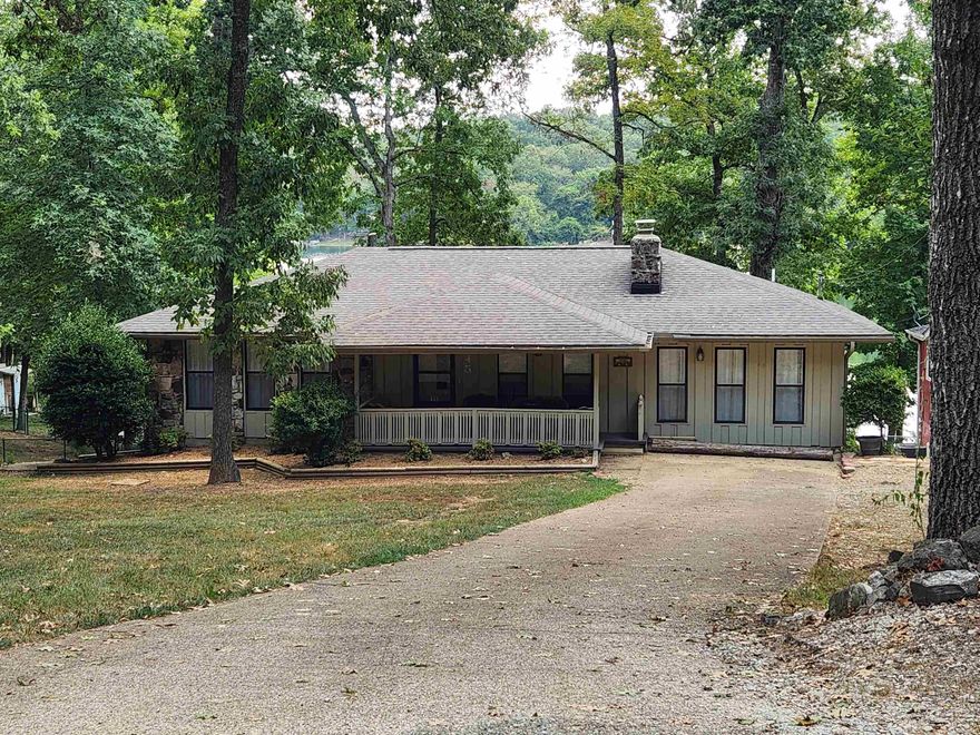 Outstanding Lakefront home on beautiful Lake Cheorkee. This 4 bedroom 3 bath home has been updated and refurbished. It is presently in the beginning stages of becoming a VRBO. Brand new roof, New paint inside and out, New floring throughout the home. The kitchen has all new appliances and counters. Primary bedroom is apart from the other bedrooms and has its own en-suite bath, dressing area, laundry, closet and access to the back deck. Wonderful lake views from the kitchen, dining area, even the back bedroom. The Partially covered back deck stretches the length of the house, offering plenty of entertainment area all with great views of the lake, the wonderfully landscaped yard and fire pit area. Nice dock for fishing and swimming. Lake Cherokee is known for its good bass fishing. Down stairs is a guest quarters with a full bath. It can be used for overflow company, mother in law suite or just as a private 4th bedroom. Book an appointment to see this one to really appreciate the beautful views and landscaping.