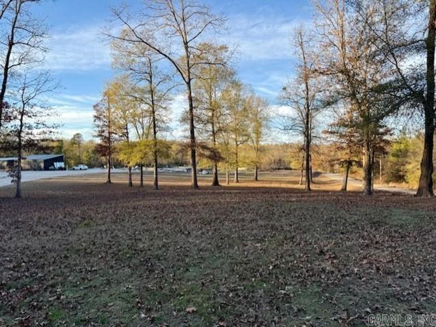 Beautiful 12.5± acres located in the prestigious Lake Hamilton School District! This exceptional property offers a blank canvas with endless building possibilities to create your dream home or private retreat. Formerly the Forestcreek Barn at Royal Ridge Wedding Venue. The land features a well, septic system, and electric to the property. Concrete slab from the barn exists along with the serene and private setting with mature trees, open spaces, and a picturesque large pond with timeless sunsets. Whether you’re envisioning an estate home or hobby farm this tranquil acreage provides the perfect setting to bring your vision to life.