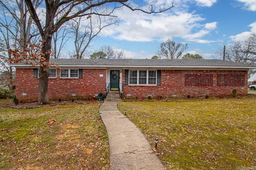 Very cute, well maintained one level home in Briarwood, move in ready!  This home boasts a sitting room and dining in front of home, a cozy den with fireplace off of the kitchen leading to the private deck, 3 nice size bedrooms and 2 baths.  It also has a large laundry room with space for storage.  Outside you will find the deck with ample area for lots of seating and large enough to entertain nicely.  New roof 2022, paint throughout, new light fixtures, deck with privacy wall 2018, double ovens 2016, dishwasher 2023.  Refrigerator, W/D convey with the home.  Come see it today!