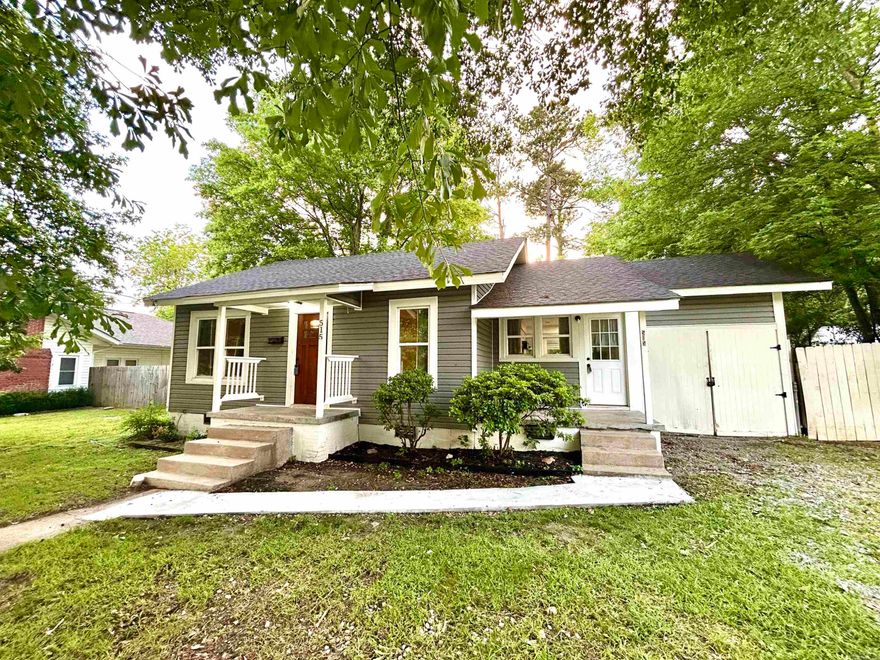 What an opportunity!  A renovated, move-in ready home at this price doesn't come along often!   This 1940s craftsman style home sits on a shaded third of acre lot with large, fenced back yard.   Enjoy your morning coffee on either the covered front porch or covered back porch.   The living room is spacious and features a brick fireplace as a focal point.  The eat-in kitchen boasts beautiful countertops, new appliances and a breakfast bar.  The third bedroom makes a great toddler room or office.   Renovations include vinyl siding, electrical, plumbing, leveling, new roof, hvac, flooring, paint, light fixtures, counter tops and bathroom!   Stackable washer & dryer and refrigerator convey at no value.  Conveniently located to Aloca Rd, downtown Benton, parks and schools.   Dont miss this opportunity!
