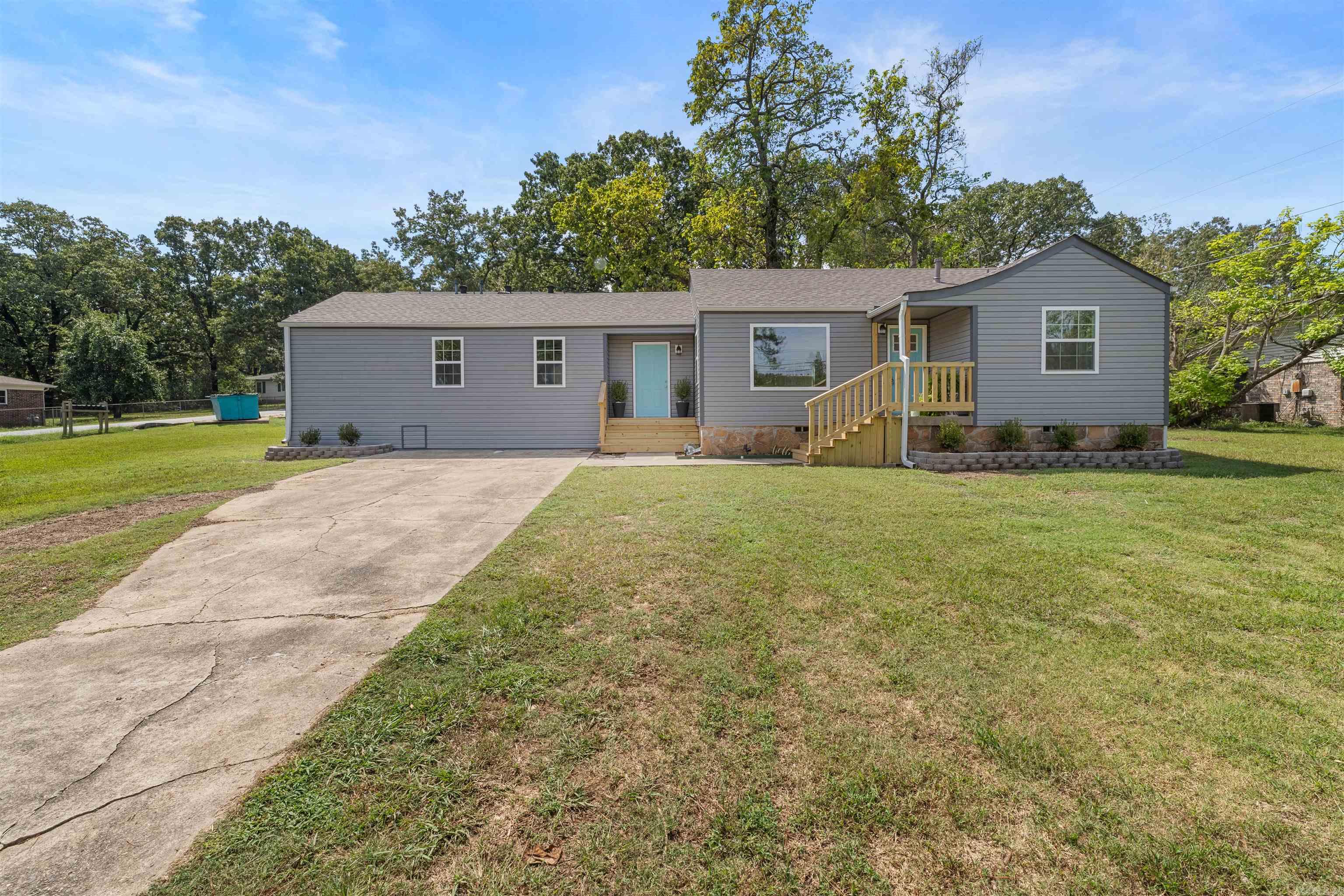 FULLY REMODELED! This home was taken down to the studs. All new plumbing, electrical, floors, fixtures, siding, windows. You name it and its new! Passed all city inspections and ready for its new Owner. Sitting on nearly half an acre and just seconds to all Sherwood has to offer or a short drive to the LRAFB! Open concept with room for a large table and bar/sitting area in the kitchen. Roof appx 2 years old. Primary bedroom is HUGE! Walk in closet and a large bathroom with soaker tub and walk-in shower. 2 guest beds on the other side of home with a full bathroom! Beautifully stained porches! SF Appx. Measuring encouraged! Agents see remarks.