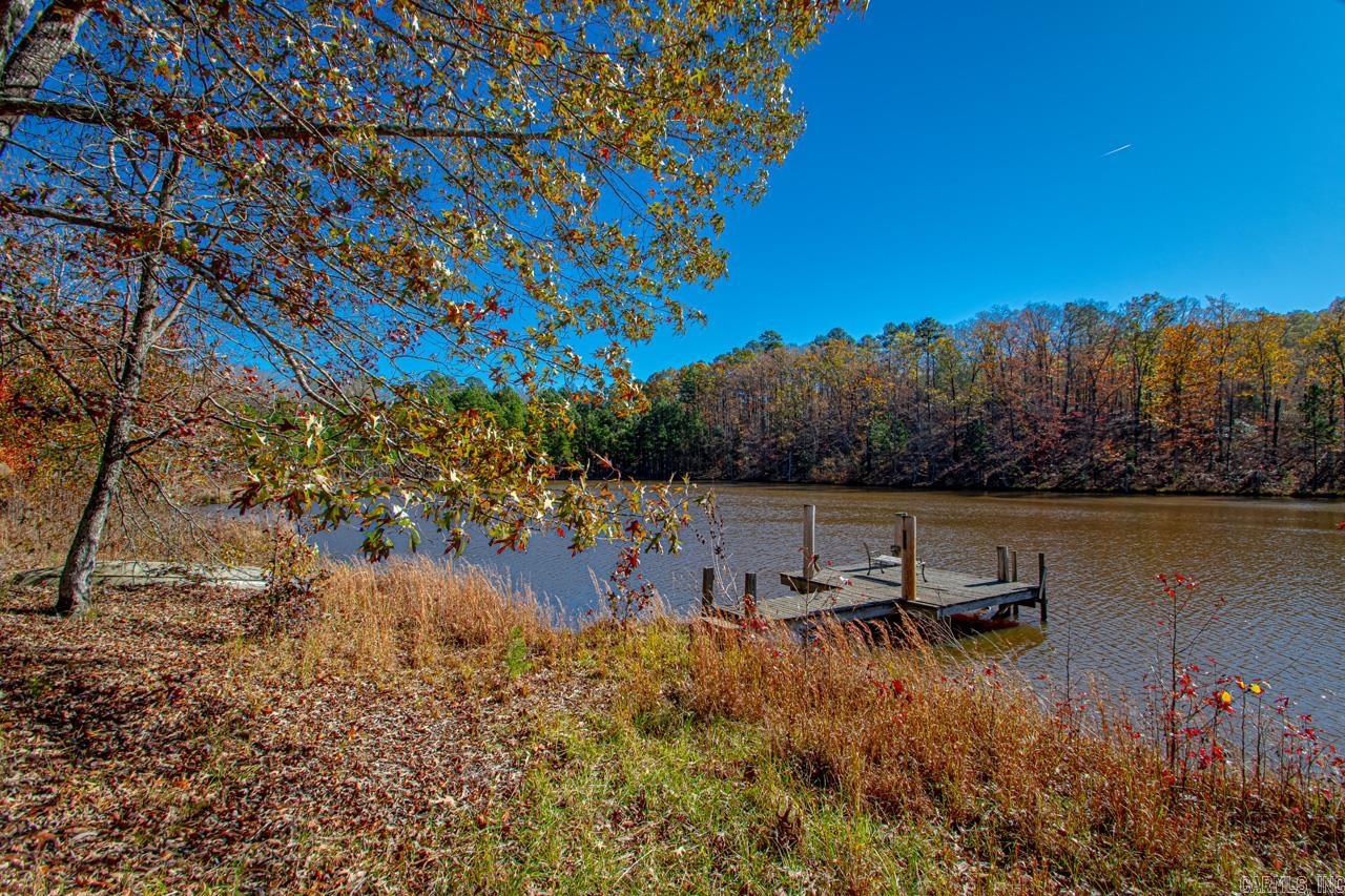 Tranquil property with stocked pond and barn. Great build site/s with privacy all around. See parcel map for location.