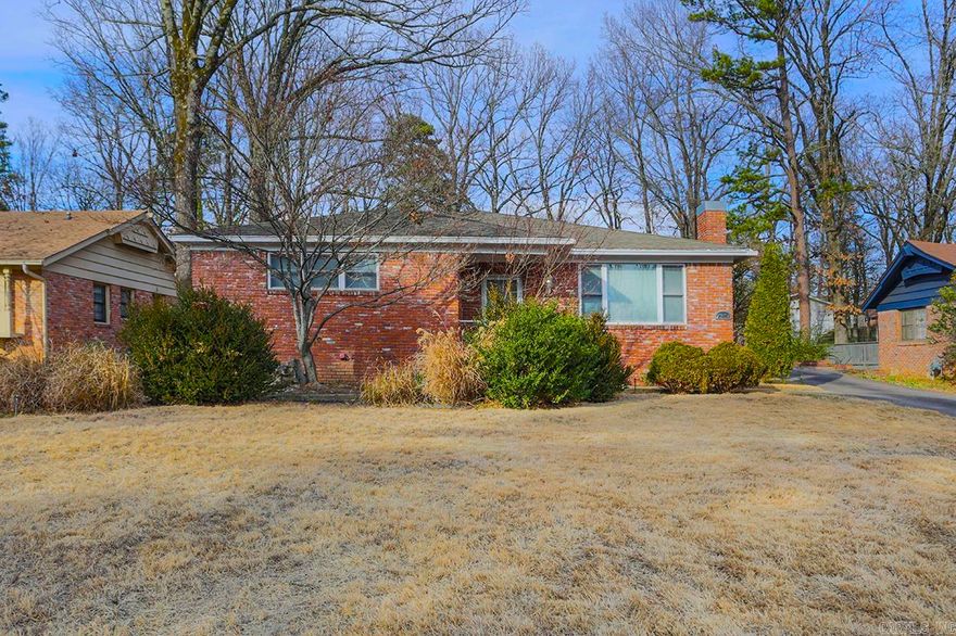 Lovely 3 BR/2 BA home in the heart of midtown!  Updated kitchen with large island and bar.  Kitchen is open to the den for easy entertaining.  Additional living area that adjoins a step up dining room.  Large primary bedroom with two closets and bathroom.  Two guest bedrooms with nice closets.  There is also a laundry room and office.  Fully fenced and private backyard with a stone patio.  Sprinkler System.  Detached oversized workshop/garage.  Come See!  Agents see confidential remarks.