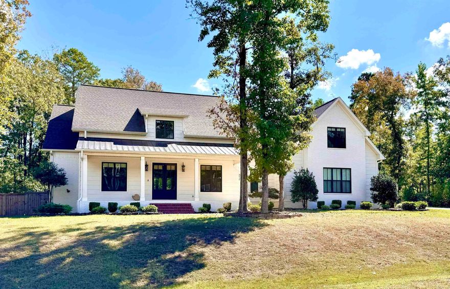 Welcome to your dream farmhouse nestled in the picturesque Tucker's Hill community! This stunning 4-bedroom, 3.5-bathroom home offers a perfect blend of charm and modern amenities. Step inside to discover an inviting open-concept living area that seamlessly connects to a beautiful kitchen, complete with a spacious walk-in pantry, making it ideal for both entertaining and everyday living. The main level also features a designated office space, perfect for those who work from home. Upstairs, a versatile bonus room awaits, ideal for a playroom or guest suite. Set on a generous 1-acre lot, the property boasts a fully fenced backyard and a large front porch perfect for relaxing evenings. Plus, a 20x30 shop offers ample space for hobbies or additional storage. With a large laundry room for convenience, this farmhouse is truly a haven for modern living in a serene setting. Don’t miss the chance to call this beautiful property home!