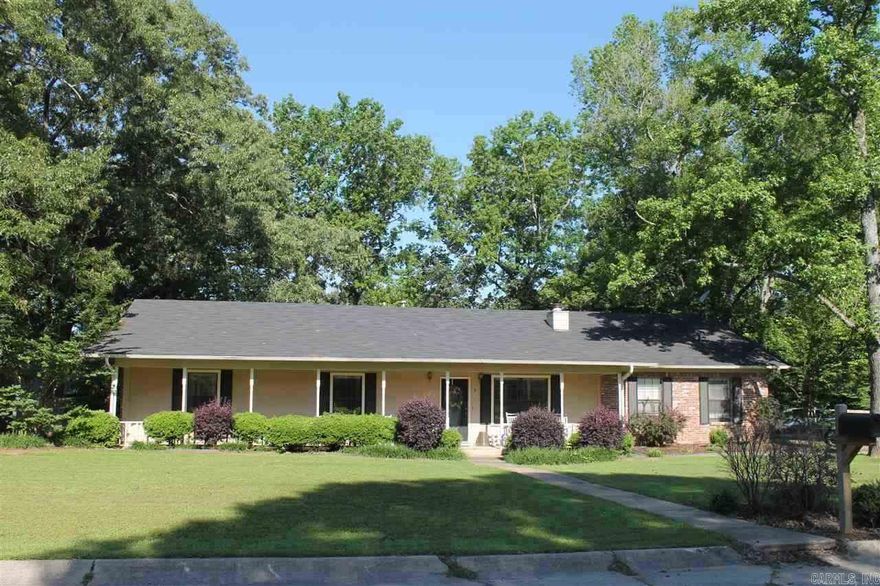 Open Floor Plan features Great Room with fireplace, opens to the dining room and kitchen.  Next to the kitchen you will find laundry room, and a bedroom or game room and a half bath separate from the other bedrooms.  All bedrooms have large closets and the master suite features a private bath.  Fenced in back yard, large deck and two car side load garage.  Extensive landscaping and overlooks Rolling Hills golf course.