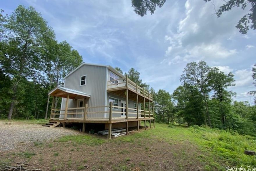 All closing costs paid with a reasonable OFFER! Ozark Mtn Home sits on 20 acres. Has creek and waterfall too.  No restrictions on this one, enjoy hunting, hiking, or maybe build your family anotjer cabin on the property. . Today is your day to own Ozark Mountain Property & an amazing home for an amazing value! Home was priced lower if it was sold unfinished.  Sellers have moved far enough ahead to go ahead & finish this amazing home. NEW HOME 6 MILES FROM NATIONAL FORREST ON 20 ACRES!